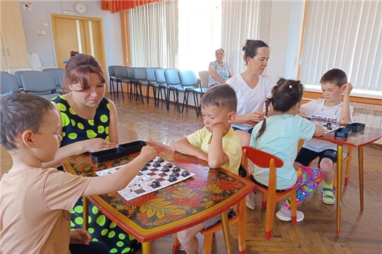 Отчетное занятие в кружке "Играем в шашки"