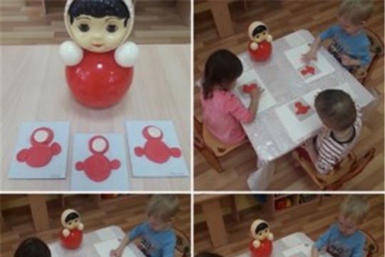Игрушка-неваляшка — ярко-красная рубашка