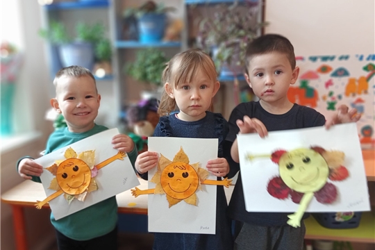 Солнышко из осенних листьев