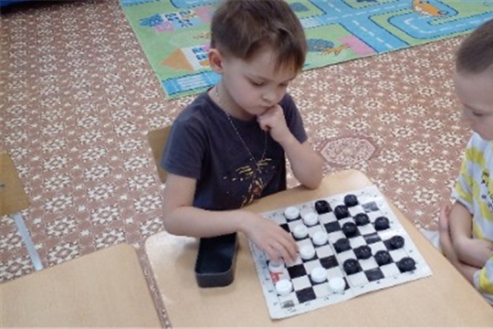 Игра в шашки