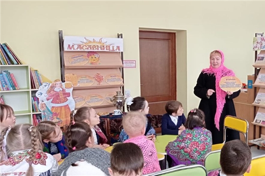 Познавательно-игровая программа "Масленицу встречаем, зиму провожаем" в отделе по работе с детьми